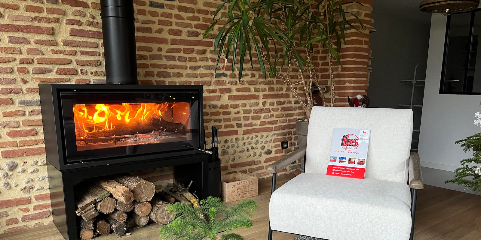 installation d'un poêle à bûches sur banc acier par BMS éco +